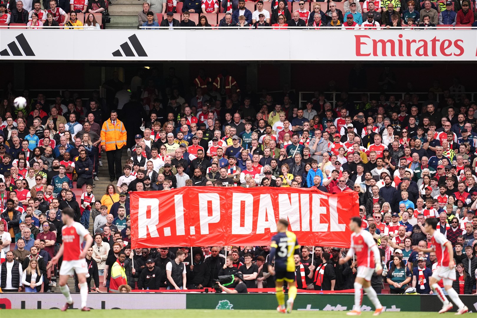 Arsenal fans hold up a banner (Adam Davy/PA)