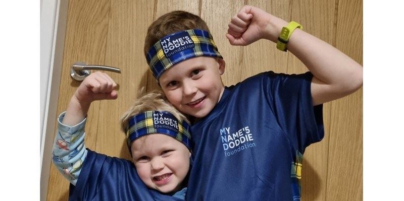 Fergus (4) and brother Robbie (7) wearing their Doddie Weir outfits.