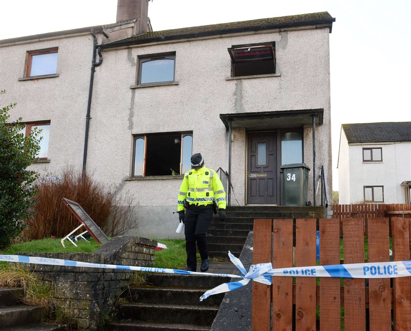 Police in attendance at the Macrae Crescent property in Dingwall after men injured in explosion. Picture: Gary Anthony