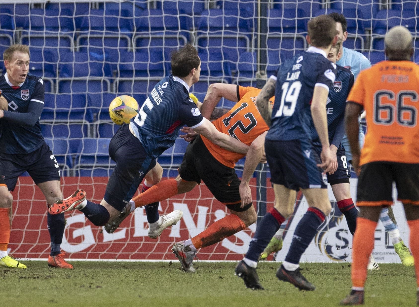 Picture - Ken Macpherson, Inverness. Ross County(0) v Dundee Utd(2). 06/02/21. Dundee Utd's Ryan Edwards heads in 2nd goal.