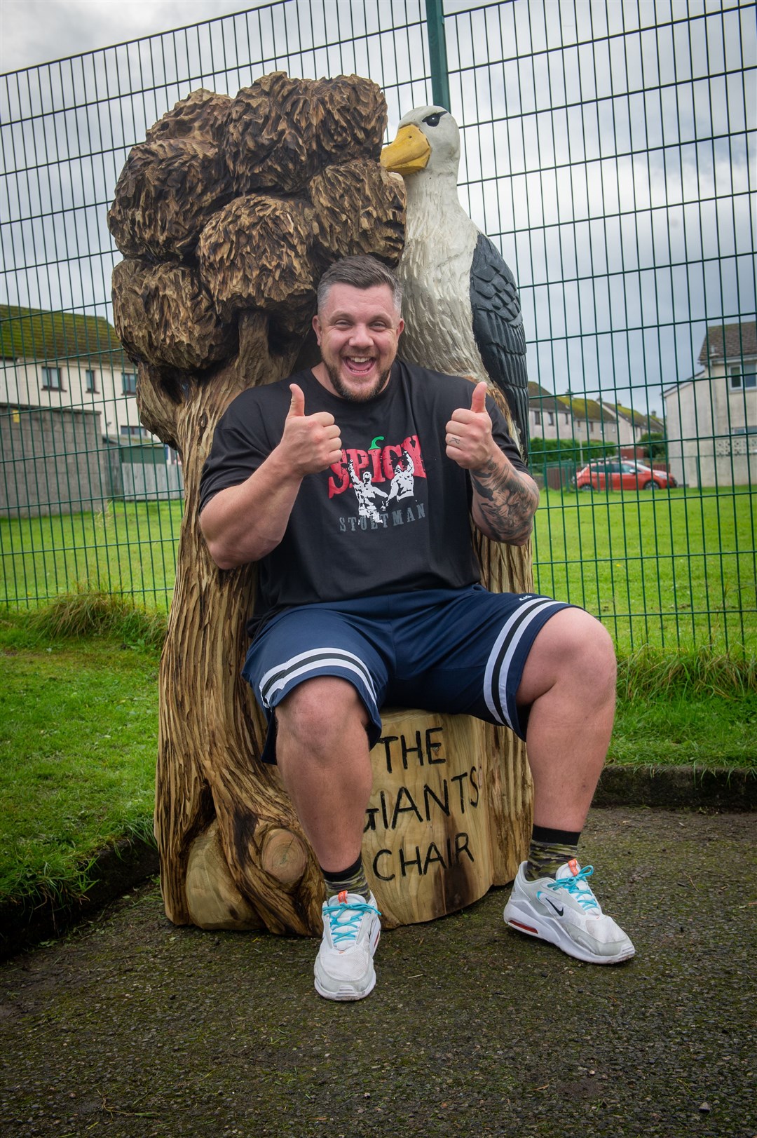 Luke Stoltman tries out the Giant's Chair he and brother Tom were surprised with at South Lodge Primary in Invergordon. Picture: Callum Mackay