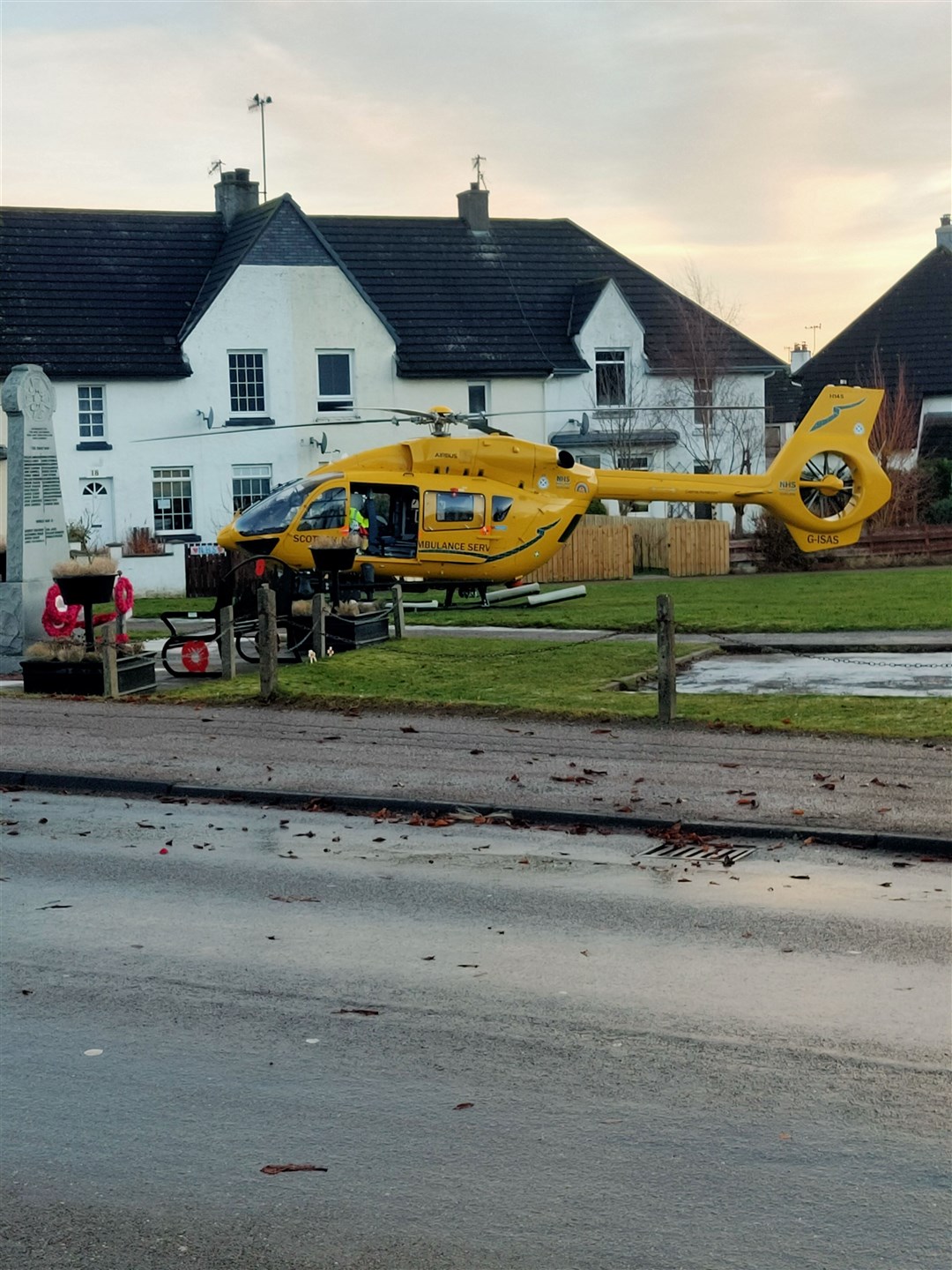 The air ambulance lands by the war memorial this morning