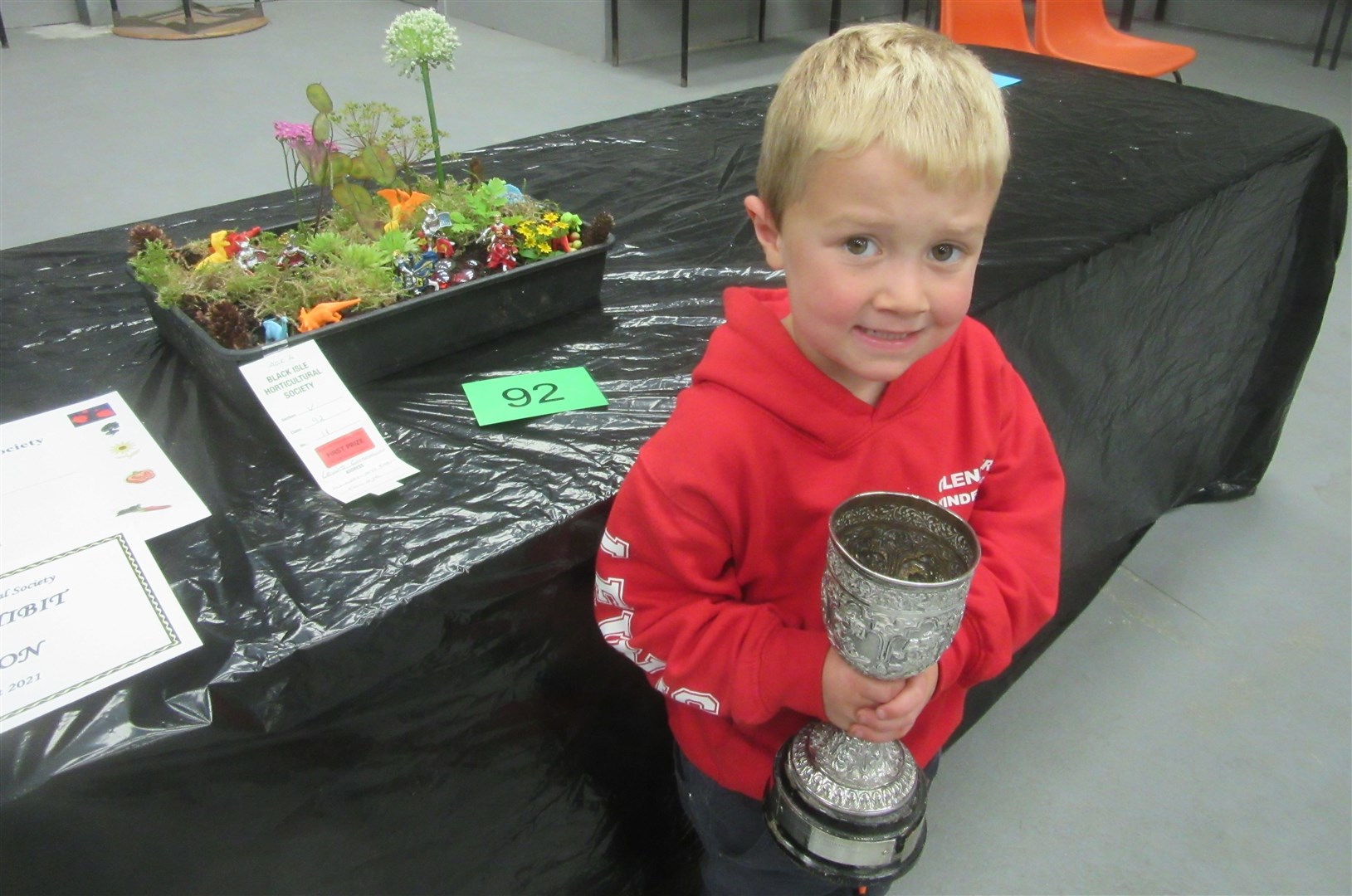 Lewis Channin with the cup for best children's miniature garden.