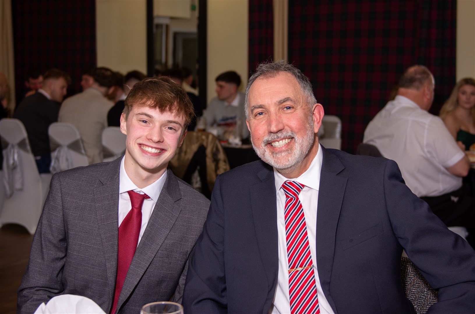 Keir Morrison and father Iain Morrison, who is the vice-chairman of St Duthus FC. Photo: George Reid