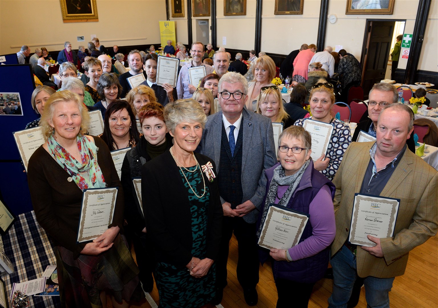 Black Isle Cares fifth birthday party at Fortrose Town Hall.Lord-Lieutenant Joanie Whiteford (centre) with carers and fundraisers who received certificates of appreciation. Picture: Gary Anthony