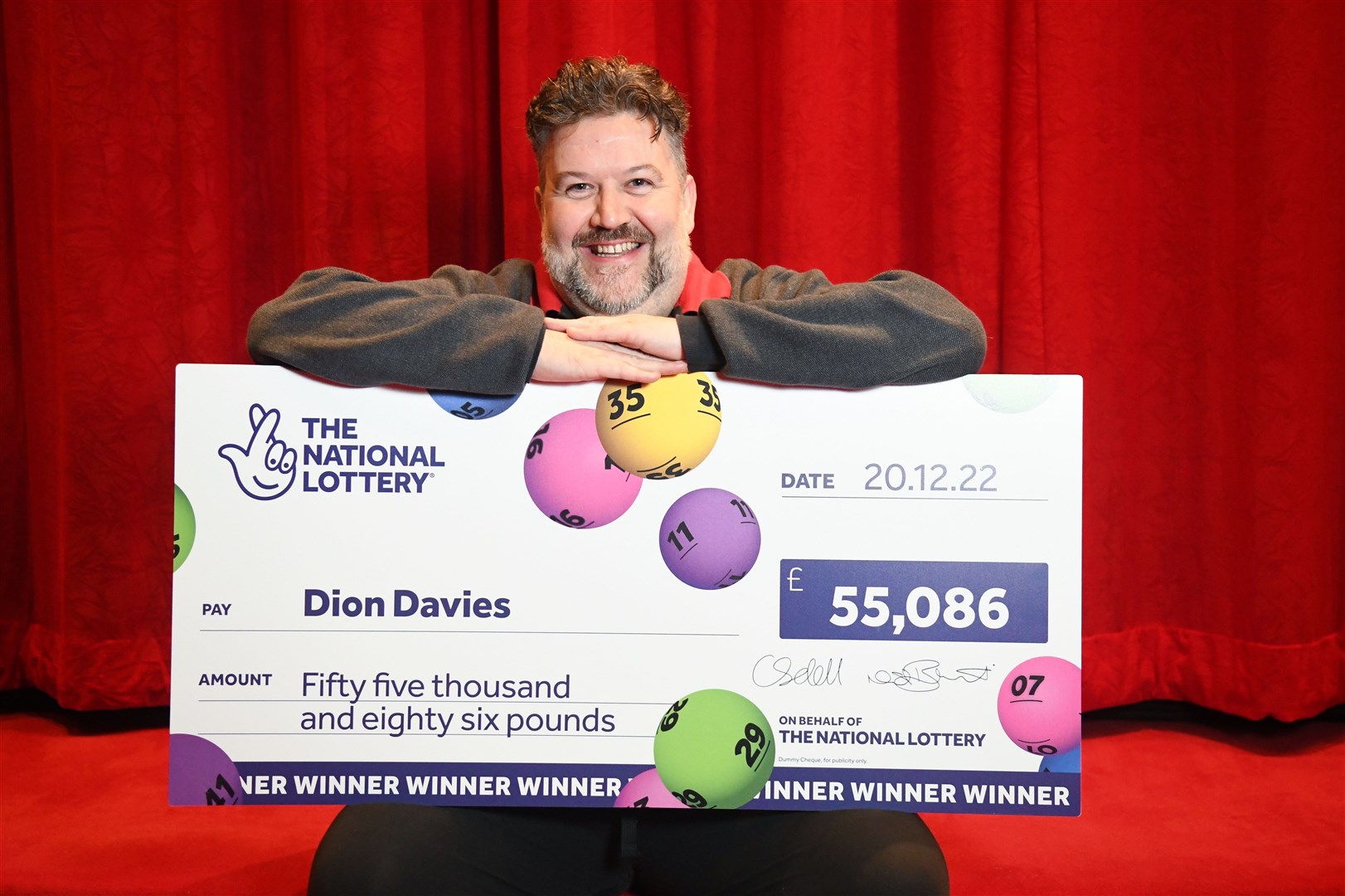 Dion Davies found the EuroMillions ticket tucked inside a sun visor while his car was being cleaned, six weeks after the draw (National Lottery/PA)