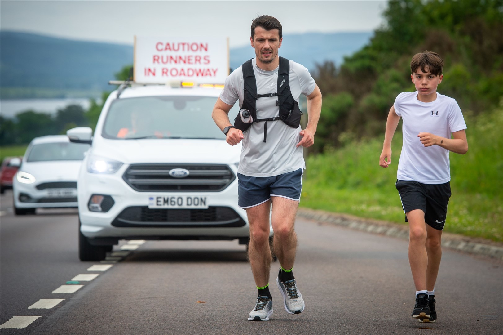 Steven Mackay and his son Dylan who joined him on the last of the four marathons. Picture: Callum Mackay