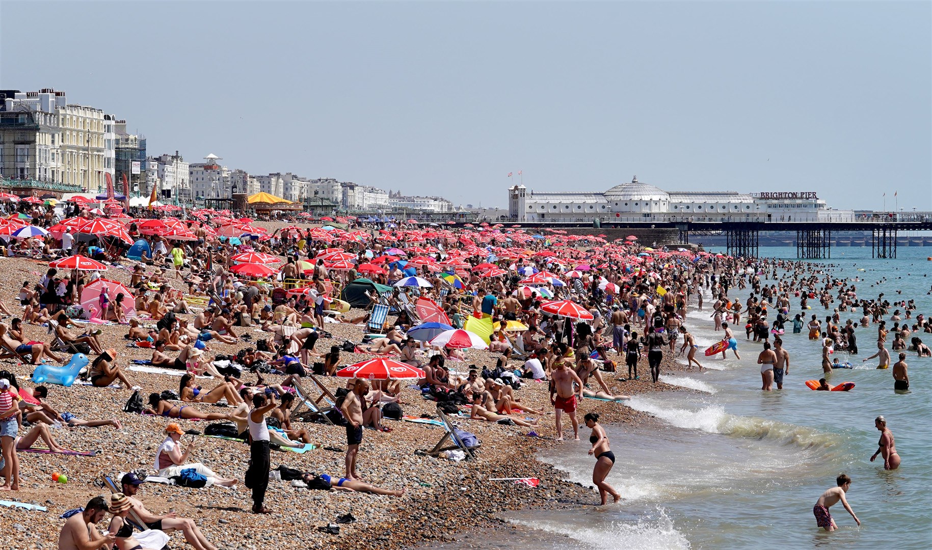 Brighton beach was packed as people attempted to keep cool (Gareth Fuller/PA)