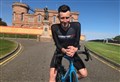 Veteran Highland cyclist Robbie Mitchell congratulated for taking NC500 crown by cyclist whose record he smashed