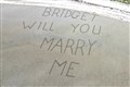 Marriage proposal etched into runway sand for man’s sky-high proposal