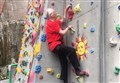 War veteran, 95, takes on climbing wall despite loss of sight
