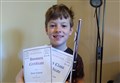 A talented young Ross-shire musician took two top prizes in a virtual music competition.