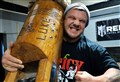 Strongman on top of world after record bid