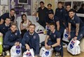 PICTURES: Ross County heroes share Christmas cheer with young hospital patients