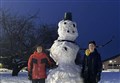 IT TAKES TWO: Invergordon twins show true grit and community spirit with snowman gesture