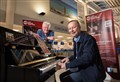 Airport piano strikes a chord with visitors – and local Highland charity