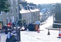 PICTURES: Gritter overturns in Highland capital