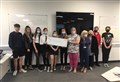 Alness Academy pupils hand welcome £3K boost to youth group's project at The Field