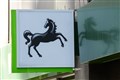 Lloyds profits beat expectations but £377m put by for loan losses in cost crisis
