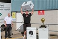 World's Strongest Man shows the 'power' in recycling and buying local