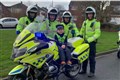 Boy, five, whose father died last year leads police on unique motorcycle ride