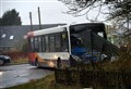 Road sign damaged after bus and van collide on the A832 near Munlochy
