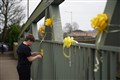 Handwritten messages on yellow ribbons left for missing mother Nicola Bulley