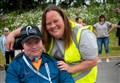 Marathon wheelchair run ends to community cheers as Alness man (21) follows dream
