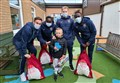 Ross County players bring festive cheer to children at Raigmore Hospital