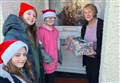 PHOTOS: Primary school pupils spread festive joy throughout Beauly