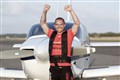 Kickboxer completes marathon pulling a plane