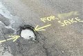 Mystery vandal strikes again about feelings towards Highland potholes