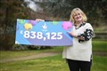Mother who worked two jobs celebrates £838,000 lottery win