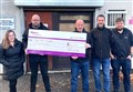 Alness firm's golf day raises £6000 for charity