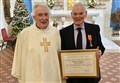 Lawyer made a papal knight in recognition of his service to the Catholic faith