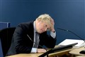 Protesters removed from inquiry as Johnson says ‘sorry’ to Covid victims