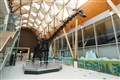 Protesters clash with museum security guards in dinosaur display