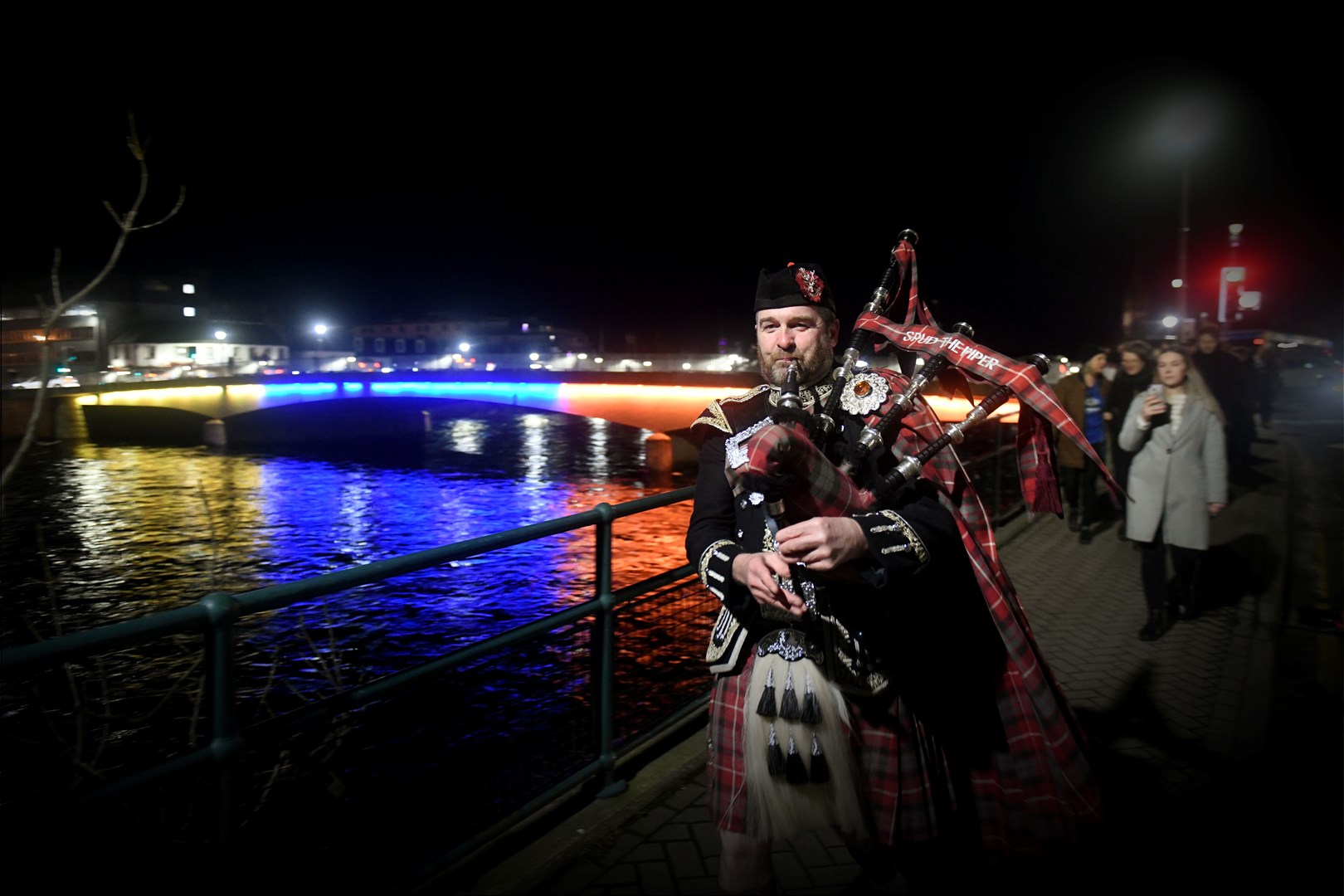 Spud the Piper leads the procession in tribute to Ron Williamson, founder of Mikeysline. Picture: James Mackenzie.