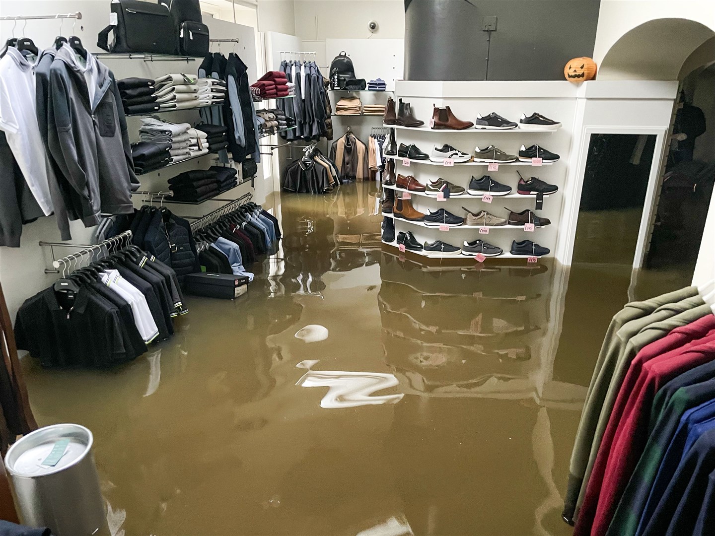 Flood water in McCartan Bros clothes store in Newry (Brendan Digney/PA)