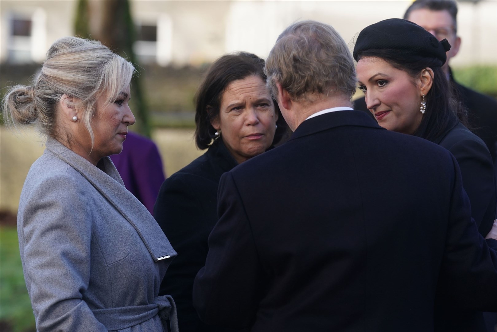 First Minister Michelle O’Neill, Sinn Fein president Mary Lou McDonald and deputy First Minister Emma Little-Pengelly speak to Mr Kenny (Brian Lawless/PA)