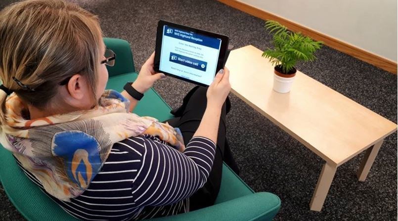 The NHS Near Me app being used on a tablet. The service allows patients to have appointments with consultants in their own homes.