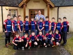 Looking smart in their new strips, the Ross-Sutherland RFC youngsters pose for a picture at The Storehouse