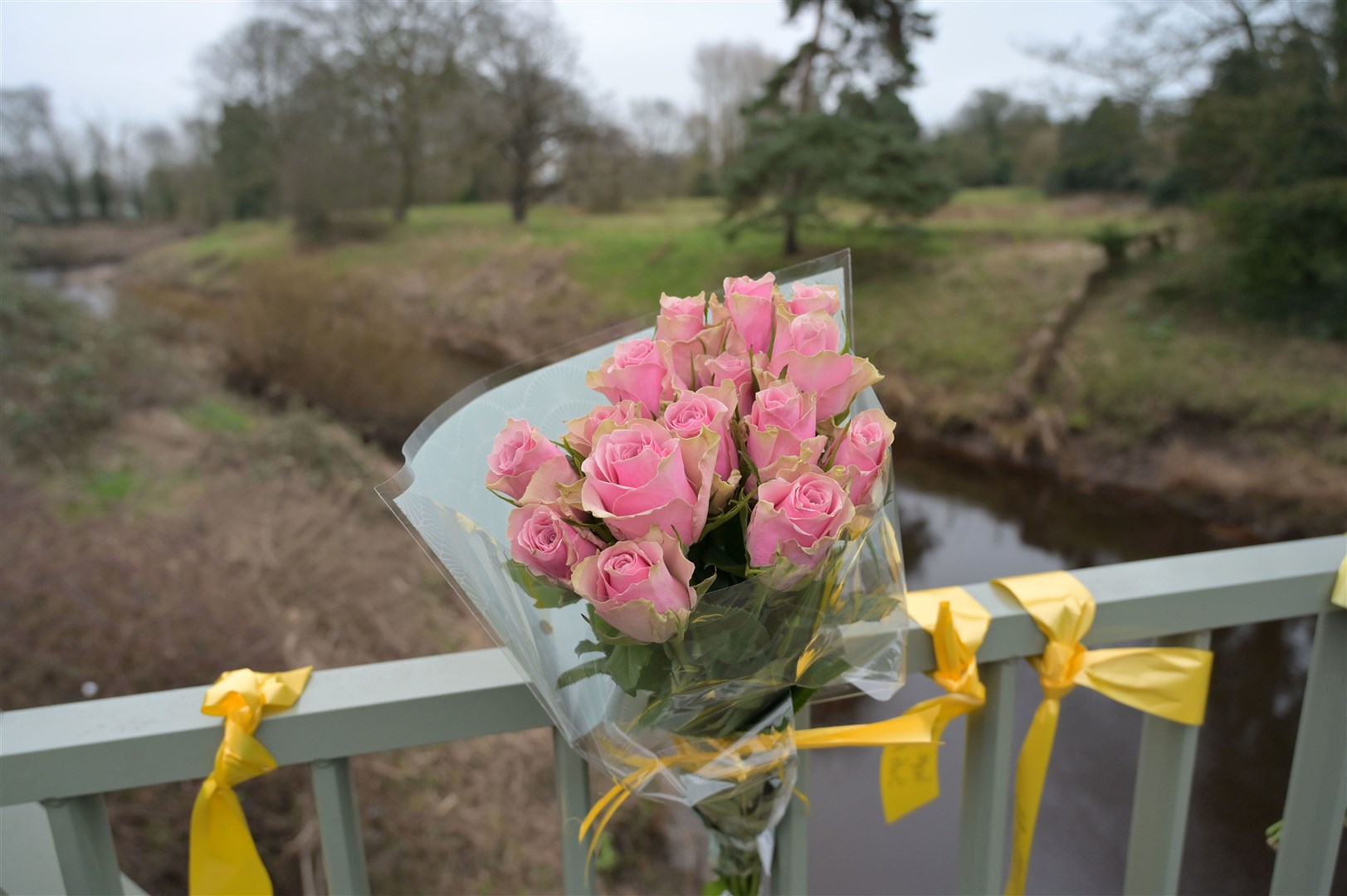 Flowers and ribbons on a bridge over the River Wyre (Dave Nelson/PA)