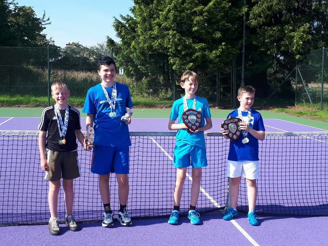 Junior winners Alexander Campbell, Marcus McAuley, Kieran Allan and Kyle Corbett at the Tain Tennis Club Championships