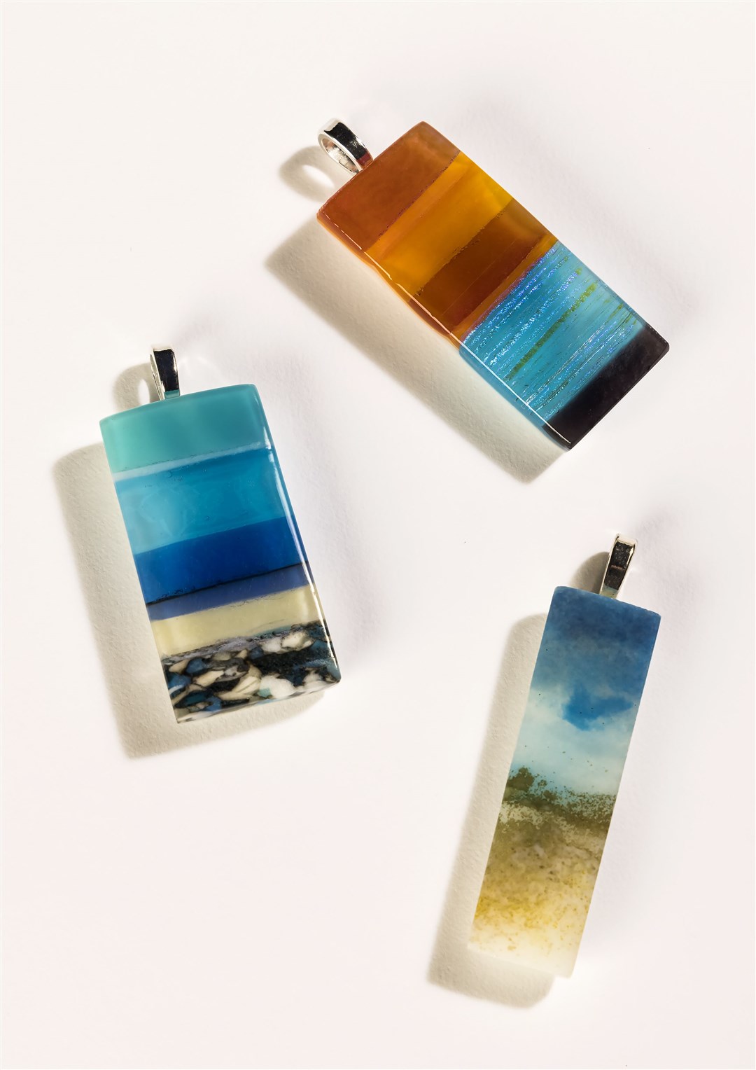 Some examples of Cromarty artist Emma Nightingale's glass designs.