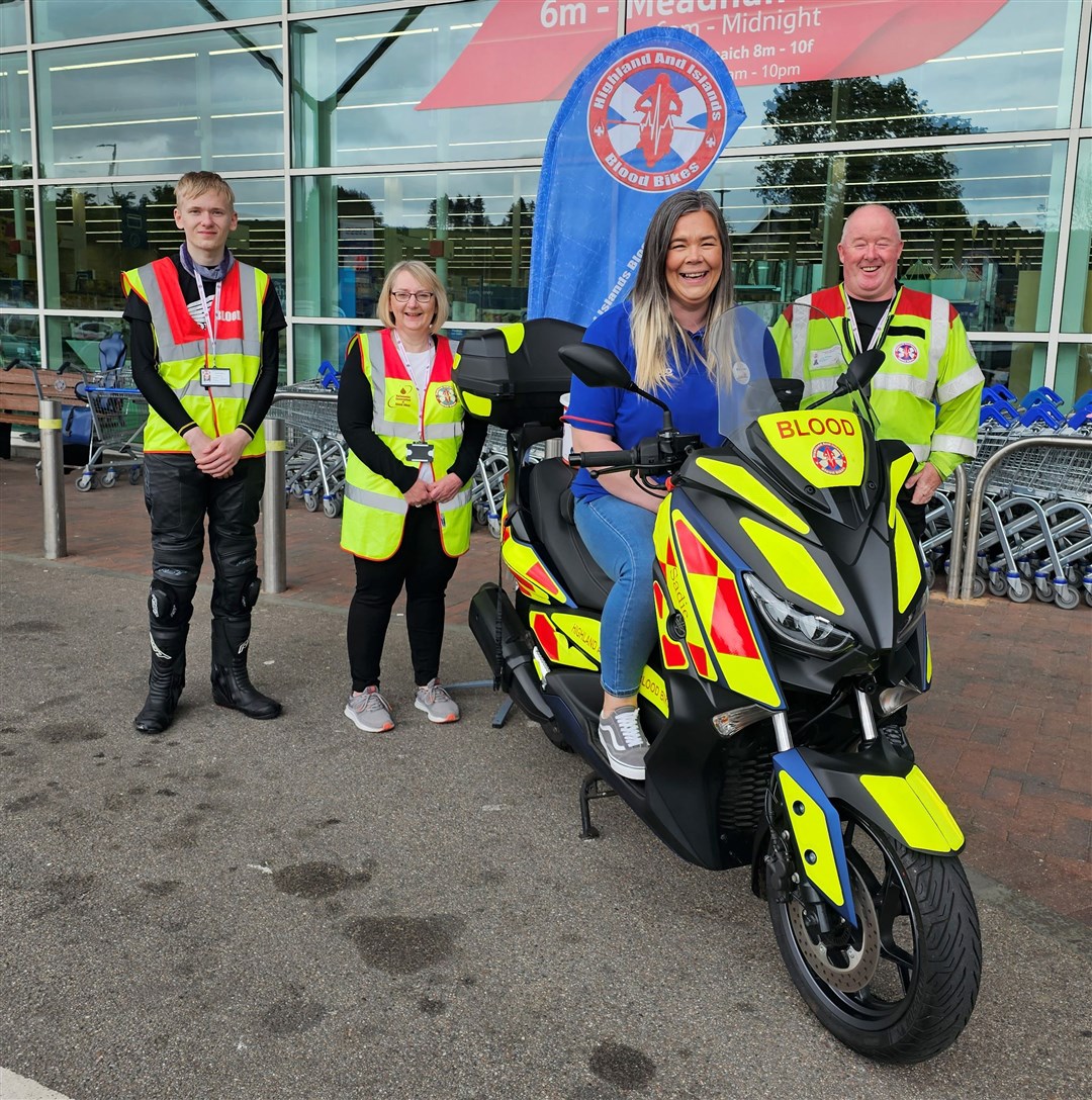 Highlands and Islands Blood Bikes fundraising at Dingwall Tesco in March 2024, with Tesco community champion Michelle Mackay.