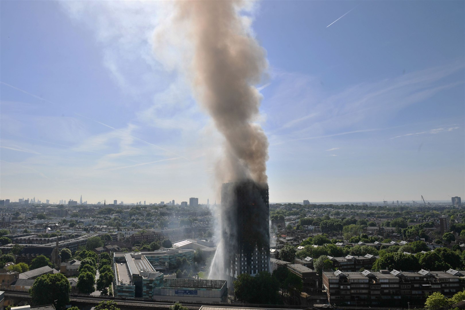 Grenfell Tower in west London, on the day of the fire (Victoria Jones/PA)