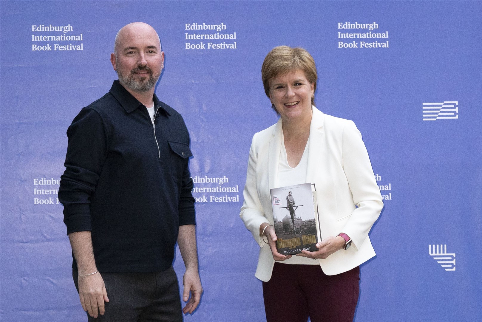 Douglas Stuart with Scotland’s former first minster Nicola Sturgeon at the Edinburgh International Book Festival (Jane Barlow/PA)
