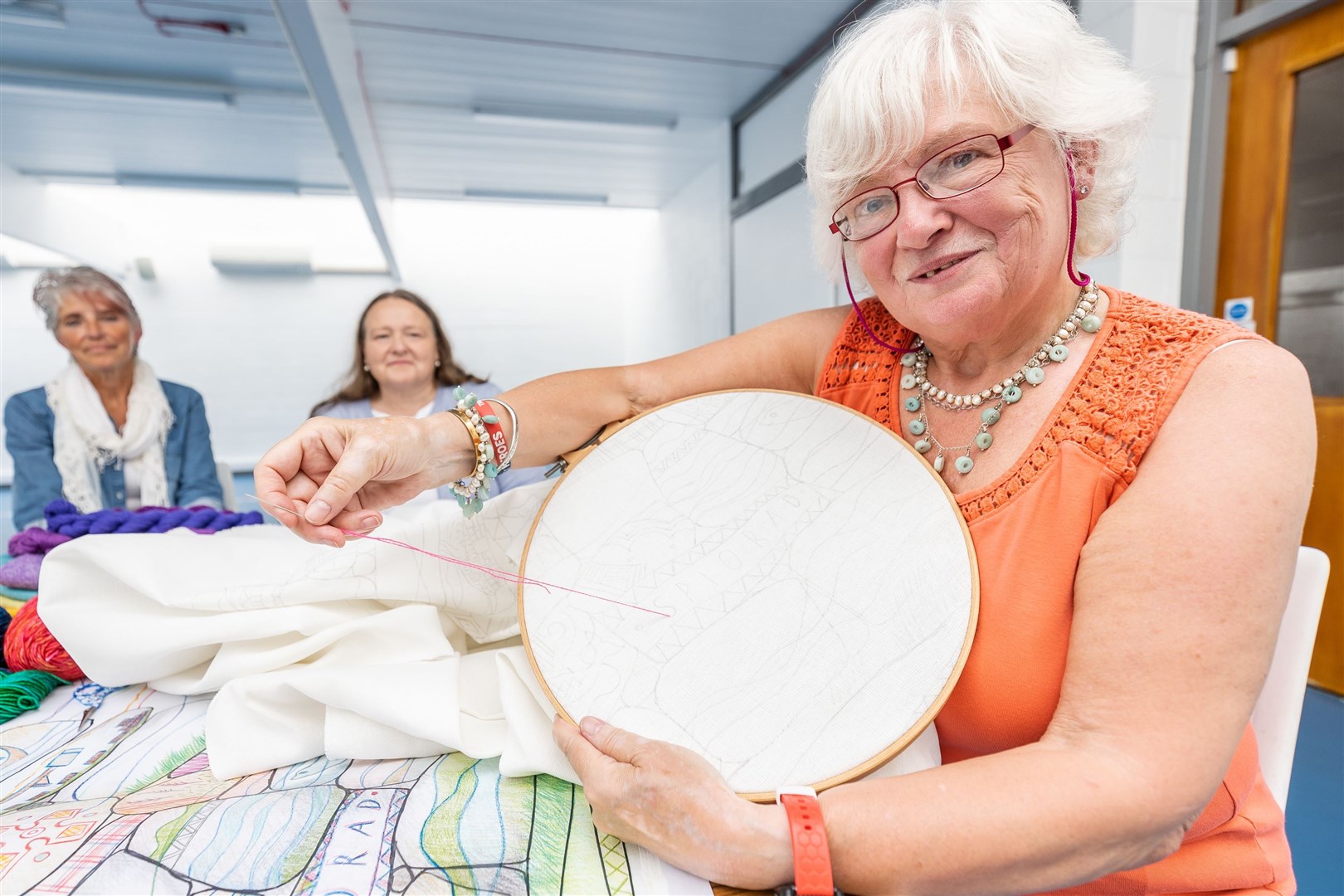 The first stitch, Averon Centre, Alness.Stitcher, Norma Bain, is pictured with Julie Coghill and Anne Thackray. Picture courtesy Paul Campbell Photography