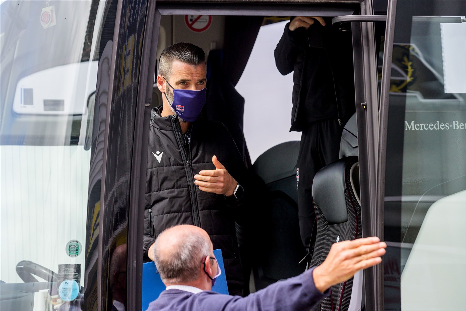 Stuart Kettlewell getting off the team bus before last weekend's 2-2 friendly draw at Livingston. Picture: Ken Macpherson